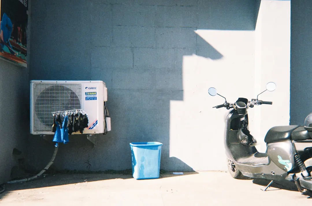 AC tune-up service on residential outdoor unit in Calgary