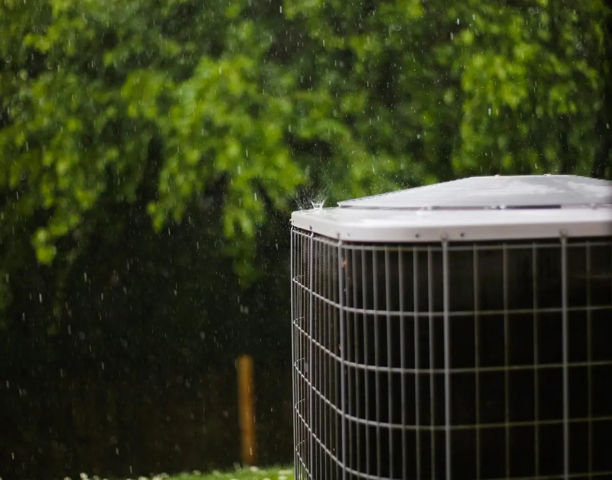 Residential outdoor AC condenser installed at a Calgary home