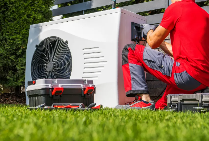 Residential cold-climate heat pump outdoor unit installed at a Calgary home