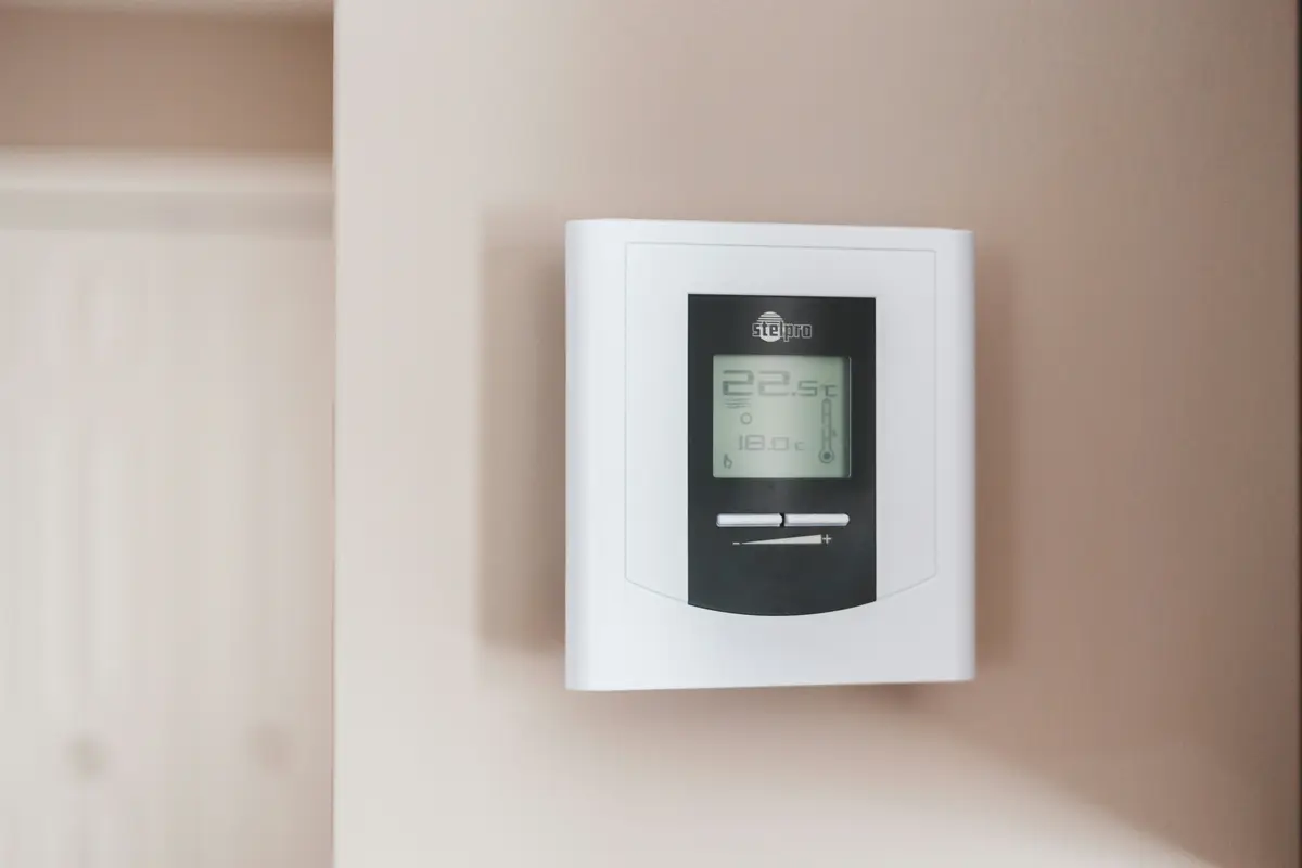 Smart thermostat installed on wall in a Calgary home
