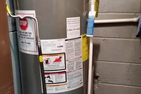 Water heater tank service in a Calgary basement